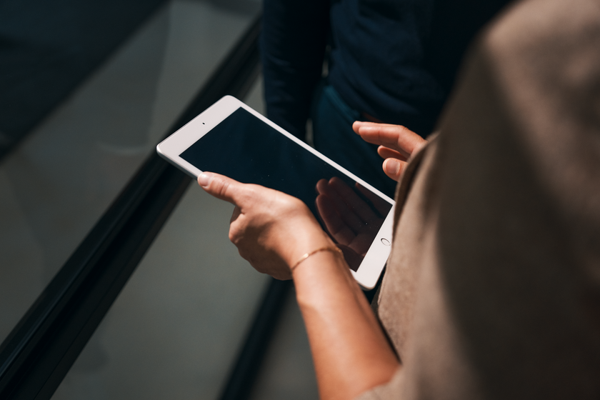 Woman holds Tablet